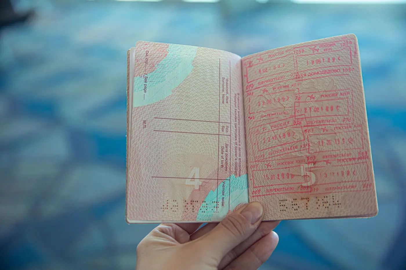 MM2H long term residency pass - passport with entry stamps